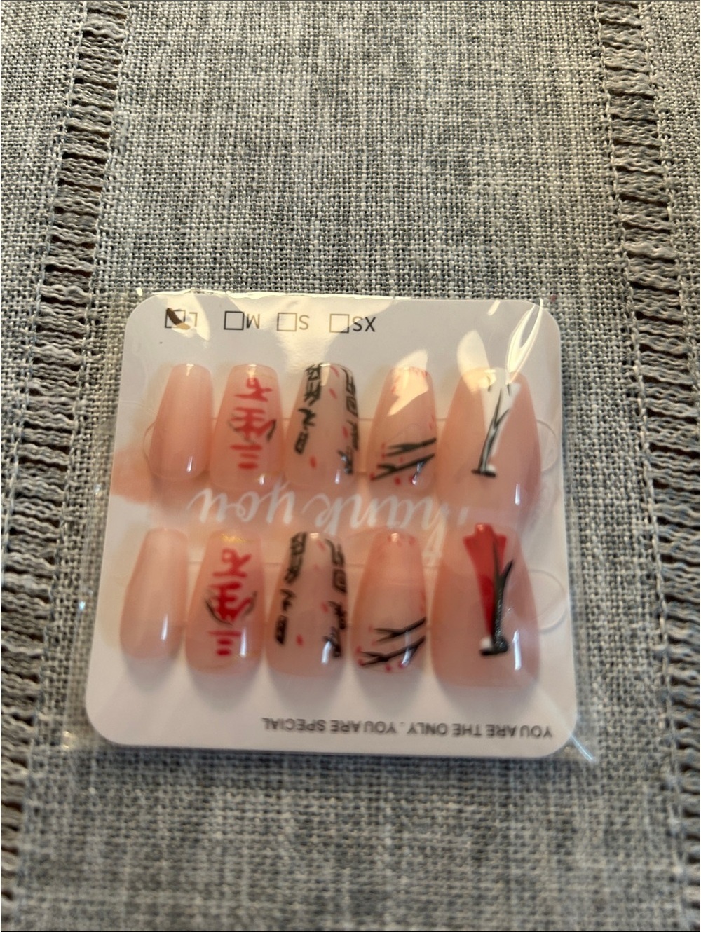 Nude Press-On Nail Set with Red & Black Floral Accents